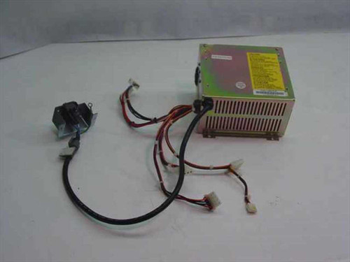 Ultra Tek UTS 130-01 130W AT power supply with attached wiring harness and external cable-mounted power switch assembly — full unit view