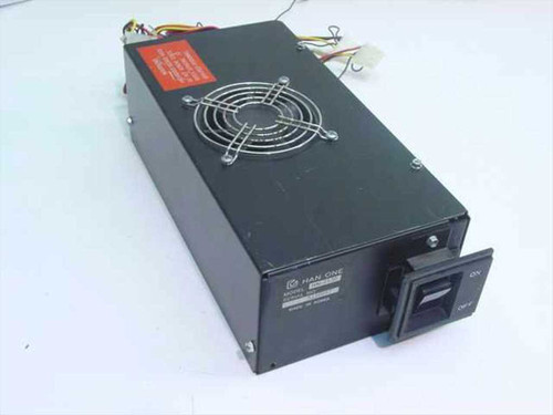 Han One HN-2130 large form factor AT power supply – three-quarter front view showing fan grille, On/Off rocker switch, and red label
