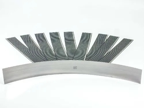 Single Solopower CIGS solar cell bent into a curved arc showing semi-flexible stainless steel substrate construction