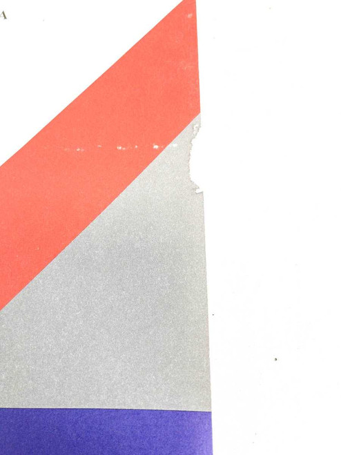 Close-up of upper right corner of Tektronix 070-8712-01 manual cover showing small tear in the cover stock
