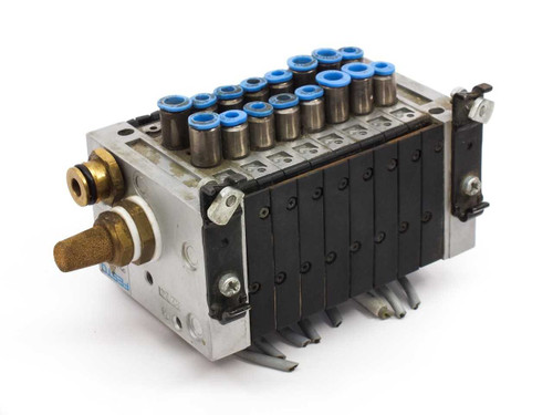Festo CPV-10-VI solenoid valve manifold — angled rear-left view showing brass port fittings and valve actuator bodies