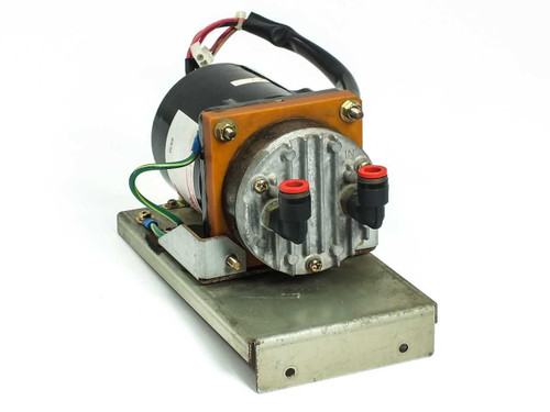 Japan Servo UIH8S25 induction motor mounted on metal base plate with orange-bracket gearhead and two red pneumatic ports – front-right view