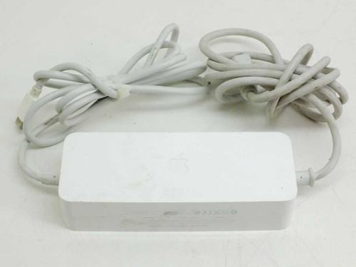 Apple A1188 Mac Mini 110W Power Adapter top view showing white brick body with Apple logo and attached cables