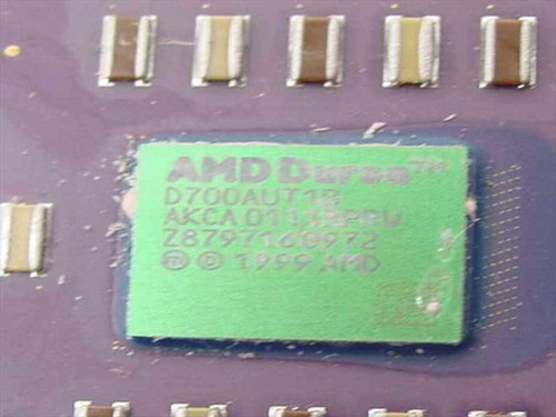 AMD Duron D700AUT1B close-up of processor label showing model number, AKCA stepping, and 1999 AMD date code