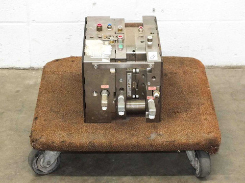 Meiki MDMI DVD CD injection mold tool on moving dolly – front-left angle view showing top fittings and control ports