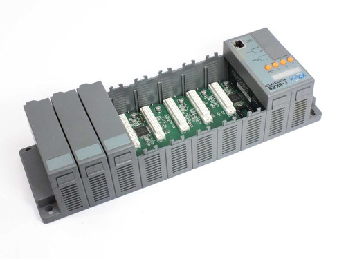 ICP DAS I-8KE8-G PLC with B884 backplane – rear-right view showing open module slots and Ethernet controller unit