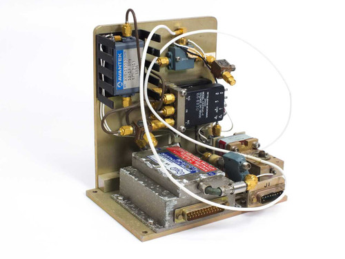 Avantek ATM-18033 RF microwave assembly front-right view showing Avantek amplifier module, SMA connectors, and D-sub connector on brass chassis