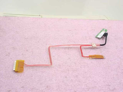 Toshiba DC025034300 14-inch XGA LCD harness cable laid flat showing full cable assembly with flex ribbon and small PCB board