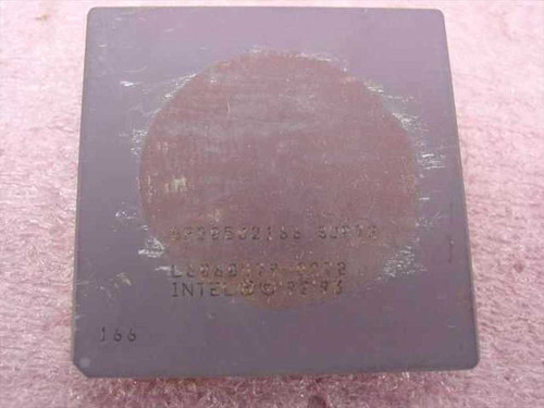 Intel Pentium BP80502166 166MHz processor — top view showing ceramic heat spreader with light oxidation/wear and '166' markings on lower left