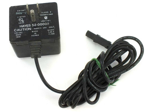 Hayes 52-00008 modem power supply – front view showing label, UL listing, and proprietary 3-pin output connector with coiled black cable