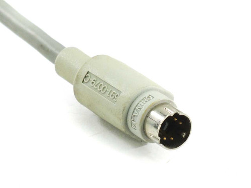 Apple M2980 ADB keyboard connector close-up showing Mini-DIN 4-pin plug with part number 591-0078 visible on housing