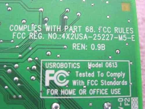 US Robotics Model 0613 PCB back label showing FCC Part 68 compliance, FCC Reg No. 4X2USA-25227-M5-E, and REN 0.9B