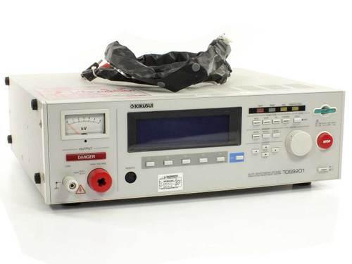 Kikusui TOS9201 high-voltage test lead set — black insulated lead bundle with red and black banana plug probes and spade/clip terminations, shown on top of unit