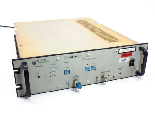 Miteq U-8153/38152 C-Band Upconverter – front panel view showing Gain Adjust, Alarms, Remote, and Frequency Select controls with RF Monitor port