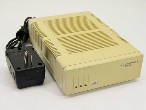 Motorola Codex 3512 DSU/CSU Modem front-right three-quarter view showing yellowed ABS housing, T/R NC ST LED indicators, model 3512 badge, and included external power supply adapter