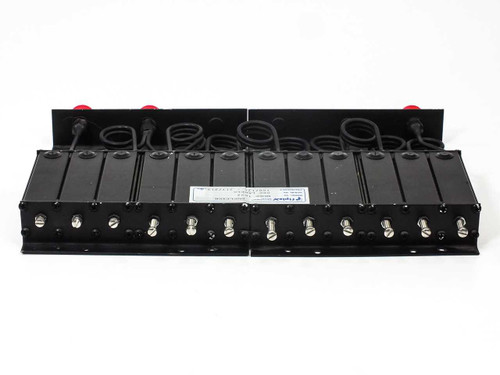 Fiplex DDBP 1622 mobile duplexer – rear view showing row of N-type female connectors across the 12 cavity modules with interconnecting cables