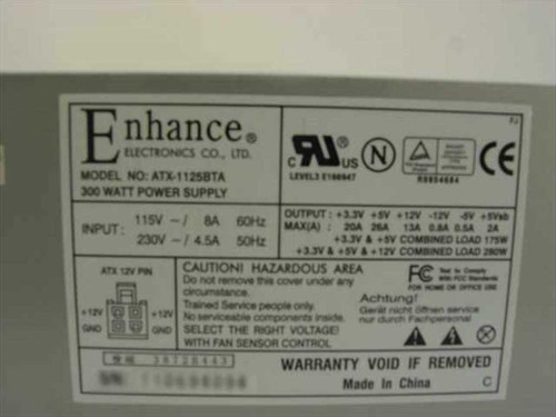 Enhance Electronics ATX-1125BTA 300W power supply – label closeup showing input/output specs, 115V/230V ratings, and Made in China designation