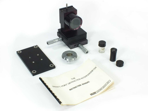 Ealing 25-9218 Smartt Interferometer complete set laid out — main body, accessories, adapter ring, eyepiece, and instruction manual