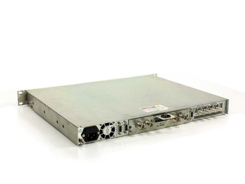 Adaptive Broadband SDM-2020 rear panel angled view showing IEC power inlet, fan, DB-9 connectors, BNC connectors, and EIA-422/530 port