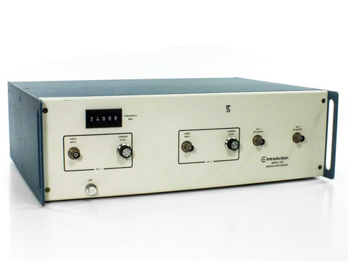 IntraAction DFE-40/102 AOM Modulator Driver – front panel view showing frequency display reading 24009, dual-channel VIDEO INPUT and CARRIER LEVEL controls, and BNC connectors