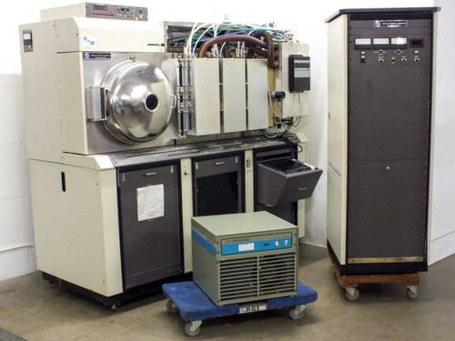 MRC 603-III sputtering system full front view showing main chamber, load-lock, control cabinet, and CTI cryopump compressor on dolly