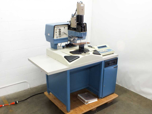 Hughes Aircraft Model 2500 Hybrid Automatic Die Bonder full system front-left view on pallet, blue cabinet with bonding head and CRT monitor
