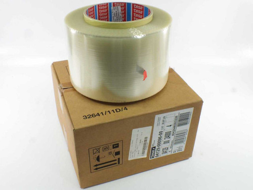Tesa 4129 transparent PET film tape roll resting on top of original brown cardboard box, label showing part number 04129-00096-00
