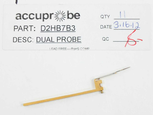 Accuprobe D2HB7B3 Dual D-Type BeCu probe card probe close-up view showing full probe assembly with needle and gold blade holder on box label