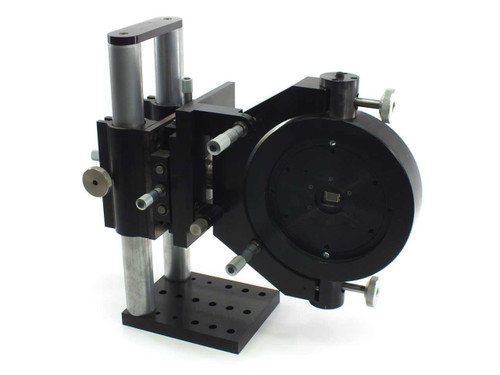 Newport 760 laser diode stand front-right view showing vertical column, black anodized rotating mount, and optical base plate with mounting holes