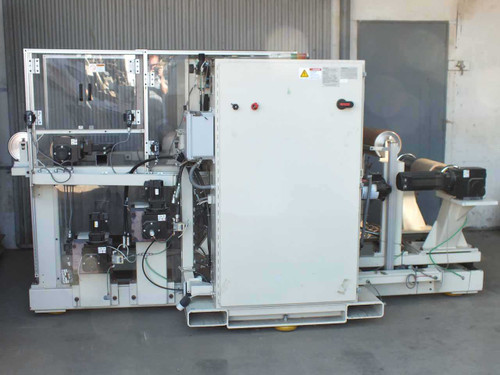 Preco coil slitter full machine overview – left side showing slitter section, control cabinet, and rewind arm