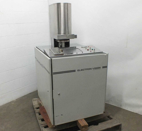 Electron Vision ElectronCure 30X e-beam curing system – front-left three-quarter view on pallet showing full cabinet and stainless steel electron column