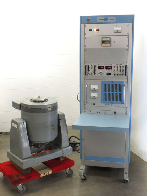Unholtz-Dickie T110 Electrodynamic Shaker and MA250-110 control cabinet – full system front view showing shaker on red pallet and upright blue control console