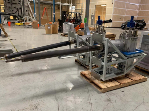Riber Jet 40K selenium cracker front-right view showing full length of dual delivery tubes and stainless steel source body on gray frame