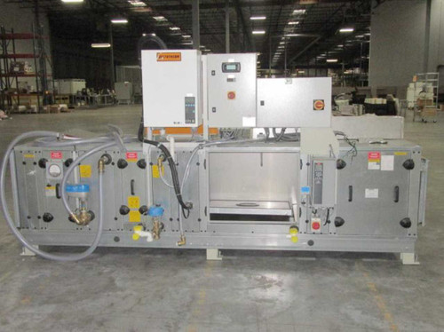 Deltatherm HYD11-100 industrial heating cooling humidifying cabinet front view showing control panel, fluid manifolds, and access sections