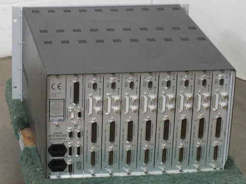 Paradise Datacom P500 rear panel showing eight P551 Traffic Interface Modules with multi-pin connectors and CE marking label