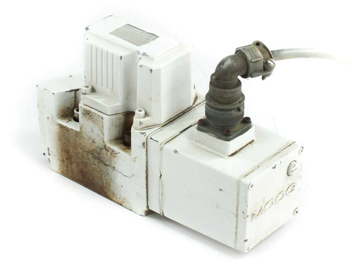 Moog J661B173A hydraulic servo valve – right-side view showing Moog branding embossed on body and angled cable connector
