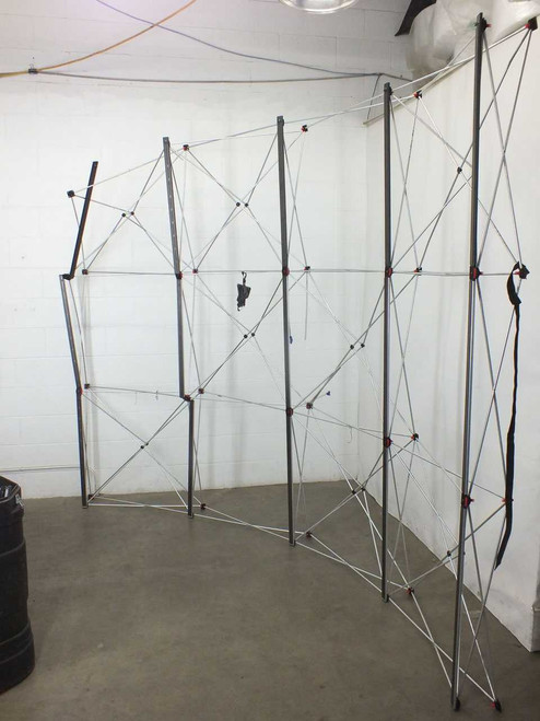 Apex 9904-QS aluminum popup display frame fully expanded, showing curved lattice structure without graphics