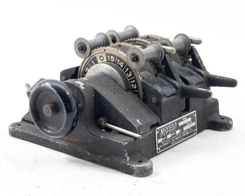 Moviola SYB 2-gang 35mm film synchronizer – three-quarter front-left view showing sprocket wheels, guide rollers, and manufacturer nameplate