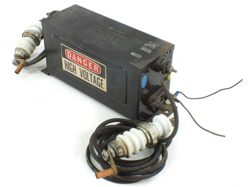 GE 9T61Y2025 Luminous Tube Transformer front view showing DANGER HIGH VOLTAGE label and two porcelain-insulated high-voltage output leads