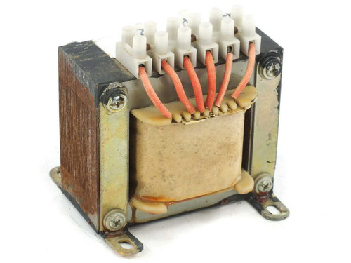 Open frame laminated core power transformer angled rear-right view showing red secondary winding leads routed to screw terminal block