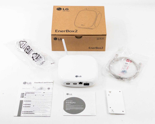 LG EnerBox 2 HGQQMSD10 solar monitoring gateway shown with original box, LAN cable, power cable, wall mount bracket, setup guide, and quick start guide