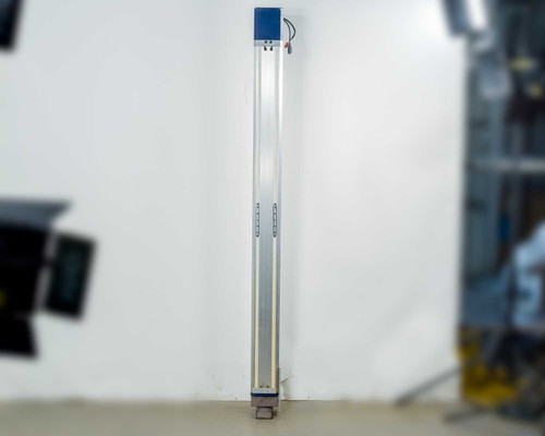 Adept Technology L12 Python Linear Module full length front view, aluminum extrusion body with blue motor housing at top, 1500mm stroke