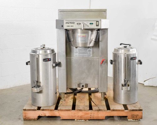 Fetco CBS-61H handle-operated coffee brewer with two Luxus TPD-30 dispensers — straight front view showing BREW, STOP, READY, and POWER controls
