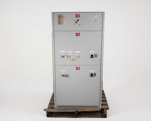 Best Power Technology transfer switch cabinet front view showing circuit breaker panel sections and warning labels