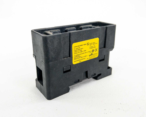 Cooper Bussmann TCFH100N CUBEForce fuse holder – angled front/side view showing yellow rating label and DIN rail clip base