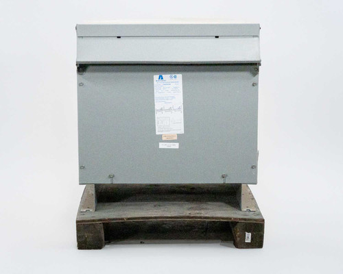 Acme Electric T3045K0034B 45 KVA step-up transformer, front face with nameplate label visible, on wooden pallet