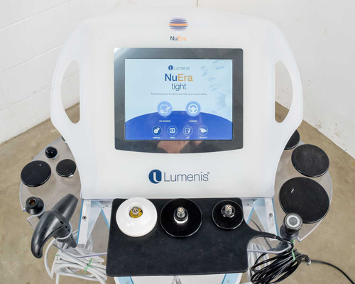 Lumenis NuEra Tight APMD130 front panel with touch screen displaying home screen and handsets on tray