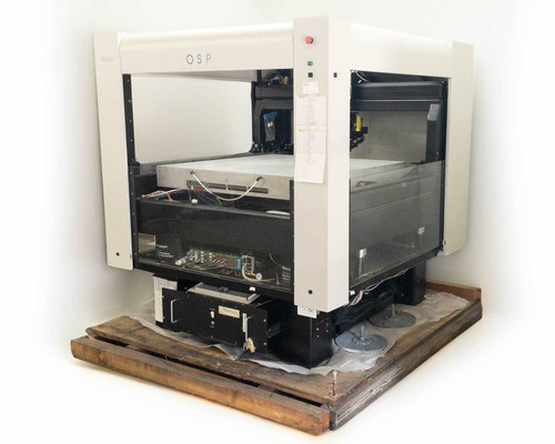 Veeco OSP Overhead Scanning Profiler – three-quarter front-left view showing white gantry enclosure, scan stage, and electronics chassis on wooden pallet