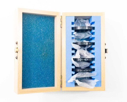CVI Laser LPFS-IR-2.00 filter set – four filters seated in blue foam slots inside open wooden storage case