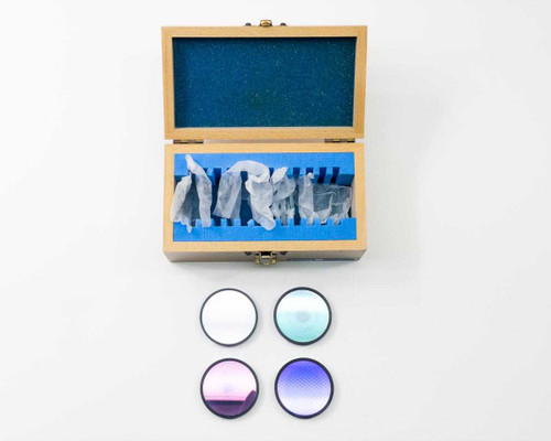 CVI Laser LPFS-IR-2.00 infrared long pass filter set – four 2-inch filters removed from wooden case displayed below open box